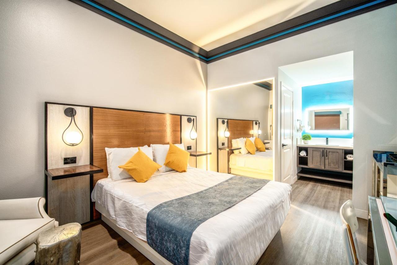 Aspire Inn Studios & Spas Беллфлауэр Экстерьер фото