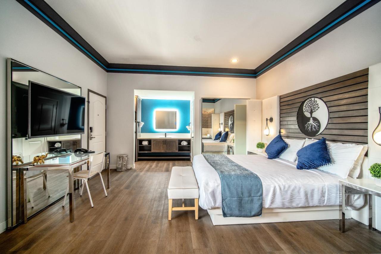 Aspire Inn Studios & Spas Беллфлауэр Экстерьер фото